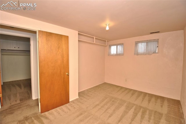 basement with carpet flooring