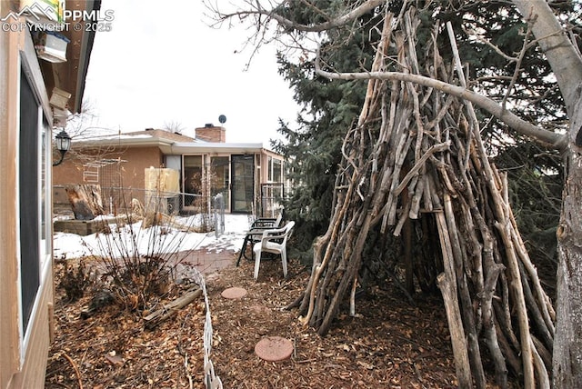 view of yard featuring a sunroom