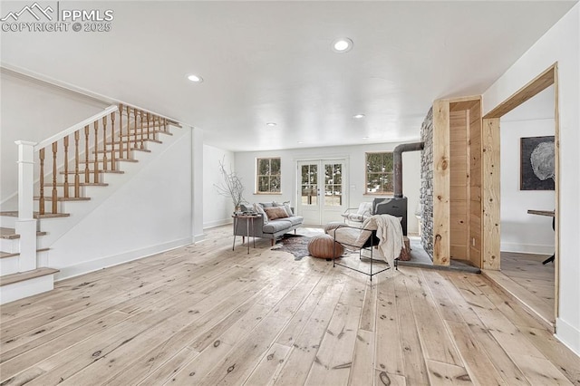 1636 Lakemoor Dr, Florissant, CO 80816 - living room with hardwood / wood-style flooring, baseboards, recessed lighting, stairway, and french doors