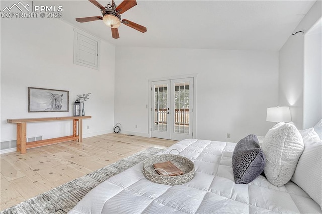 1636 Lakemoor Dr, Florissant, CO 80816 - bedroom with access to exterior, vaulted ceiling, french doors, wood finished floors, and baseboards