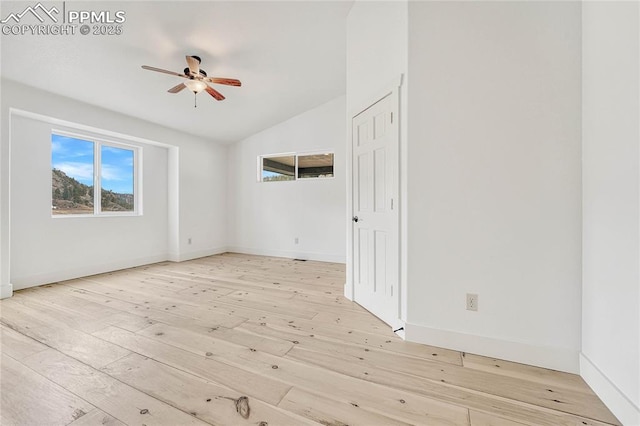 1636 Lakemoor Dr, Florissant, CO 80816 - spare room with baseboards, lofted ceiling, ceiling fan, and light wood finished floors