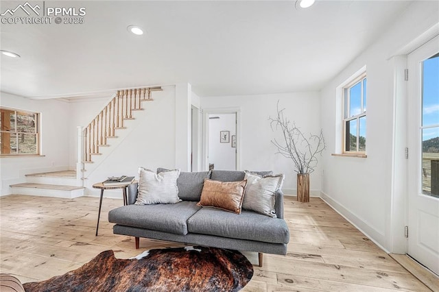 1636 Lakemoor Dr, Florissant, CO 80816 - living room featuring baseboards, recessed lighting, light wood-style floors, and stairway