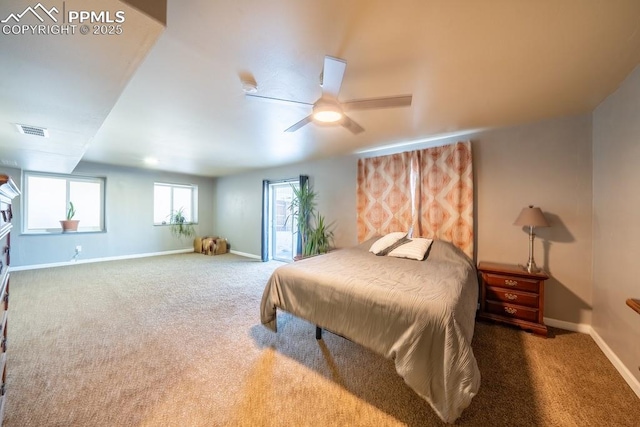 bedroom with dark carpet and ceiling fan