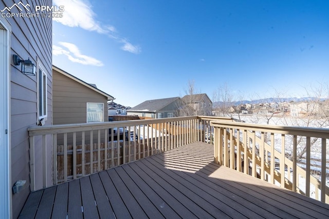 view of snow covered deck