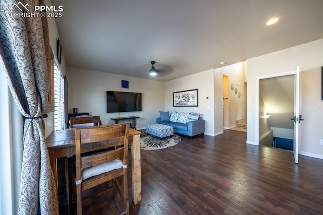 interior space with dark hardwood / wood-style floors and ceiling fan