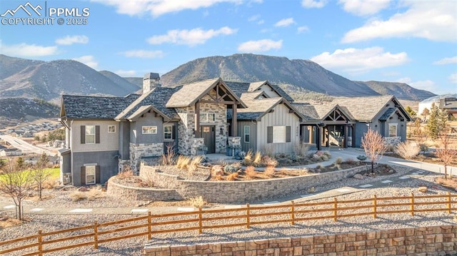 view of front of house featuring a mountain view