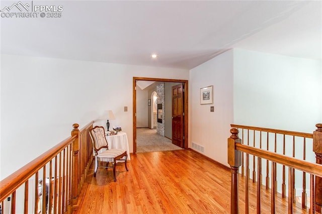 hallway featuring light wood-type flooring