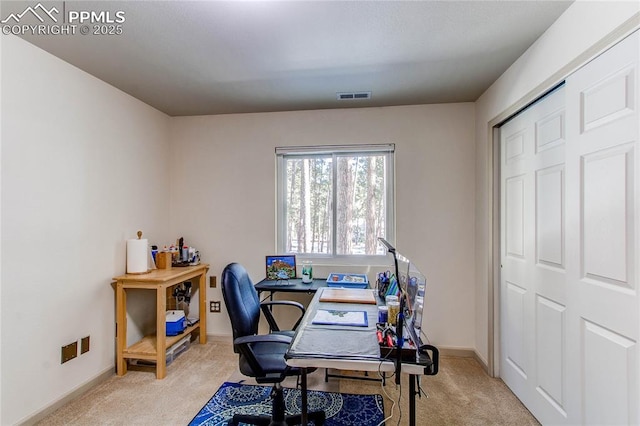 office area with light carpet