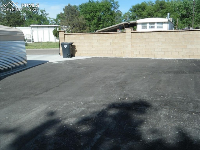 view of patio / terrace featuring fence