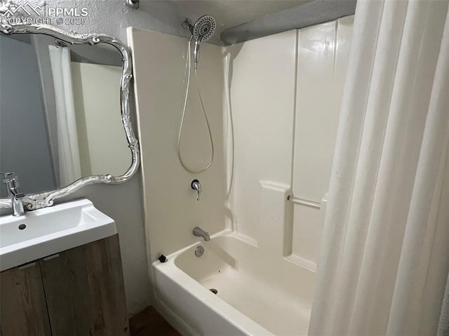 bathroom with a sink and shower / tub combo with curtain