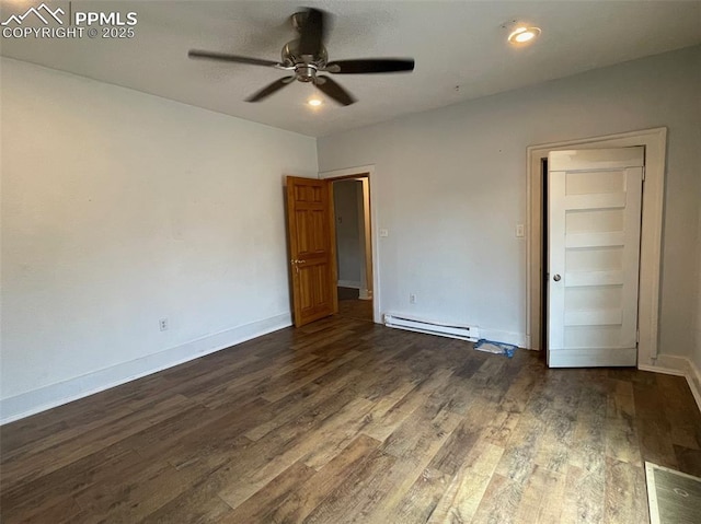 unfurnished bedroom featuring visible vents, dark wood-style floors, baseboards, and a baseboard radiator