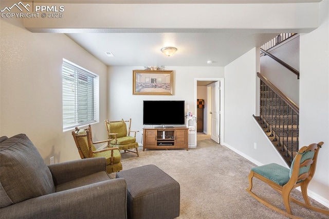 living room with light colored carpet