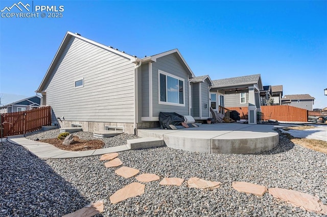 back of house featuring a patio