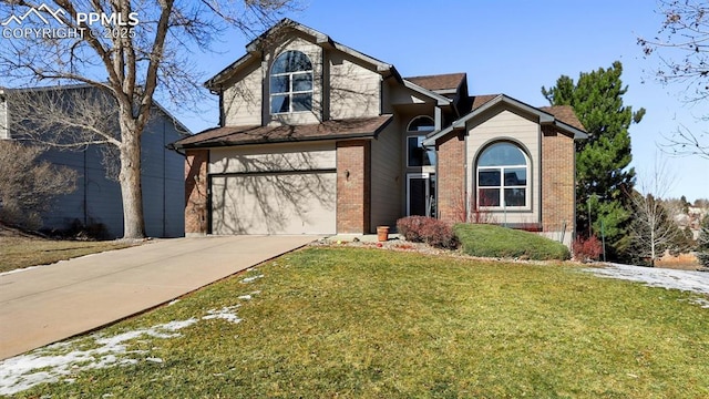 front of property with a garage and a front lawn