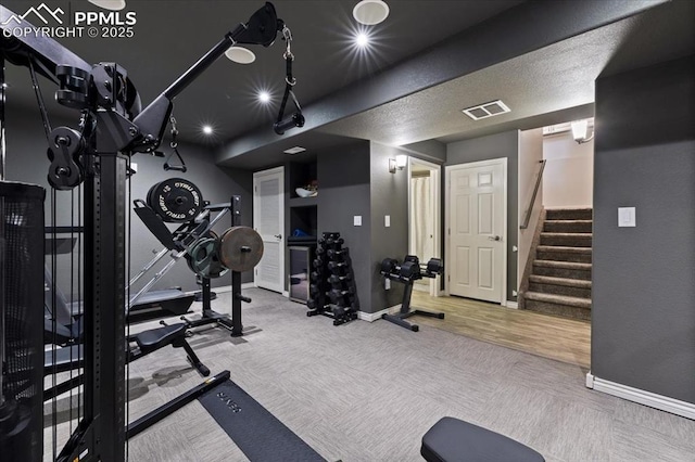 gym featuring carpet floors