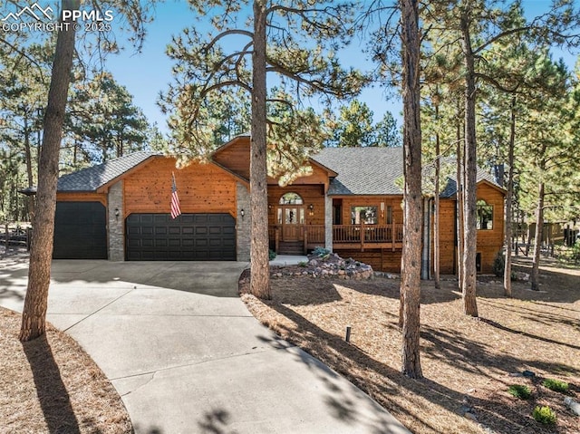 view of front of house featuring a garage and covered porch