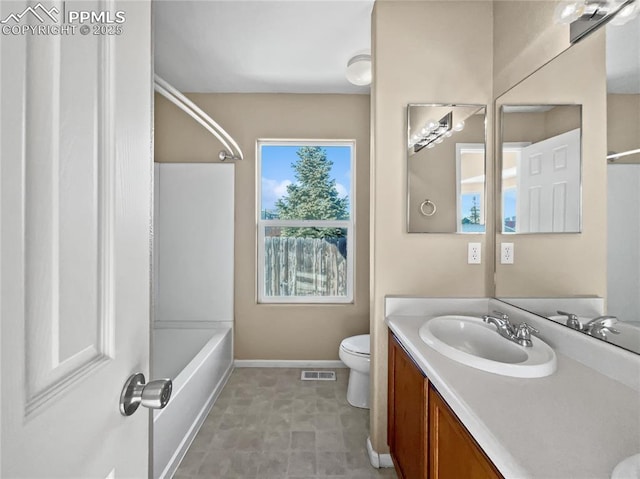 full bathroom with vanity,  shower combination, and toilet