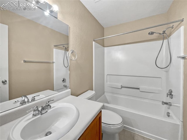 full bathroom featuring shower / tub combination, vanity, tile patterned floors, and toilet