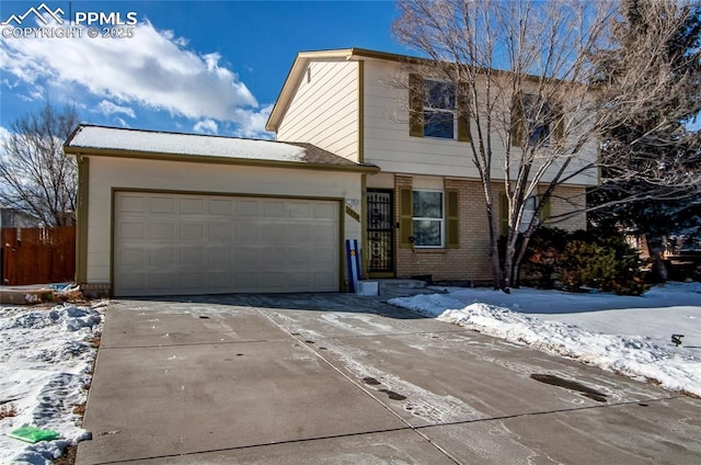 front of property with a garage