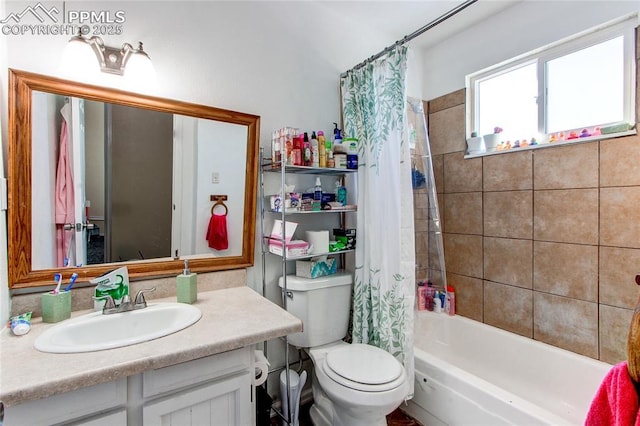 full bathroom featuring vanity, shower / bath combination with curtain, and toilet