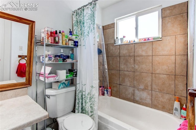 full bathroom with vanity, toilet, and shower / bath combo