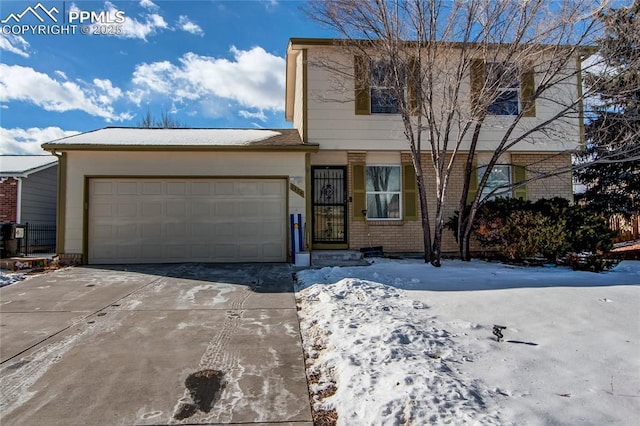 view of front of property featuring a garage