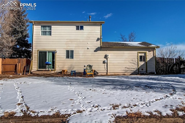 view of snow covered property