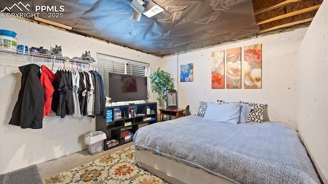 bedroom with concrete floors