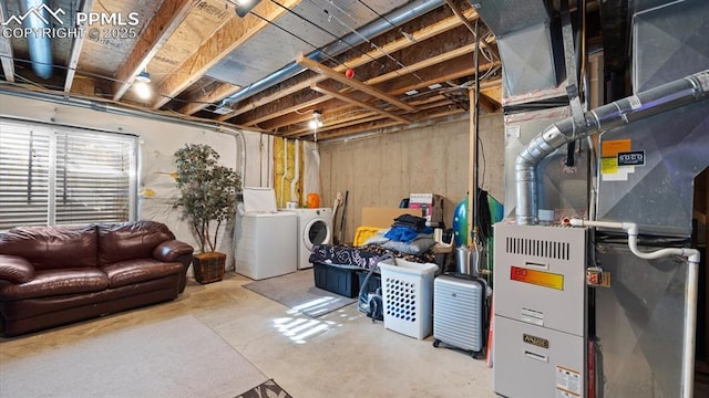 basement featuring separate washer and dryer