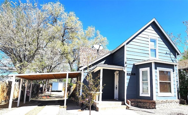 view of front of house featuring a carport