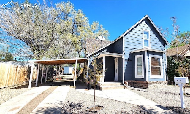 view of front of house with a carport