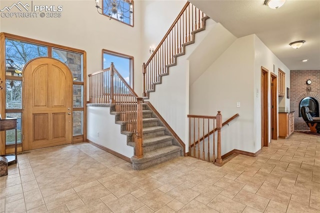 entrance foyer featuring a high ceiling