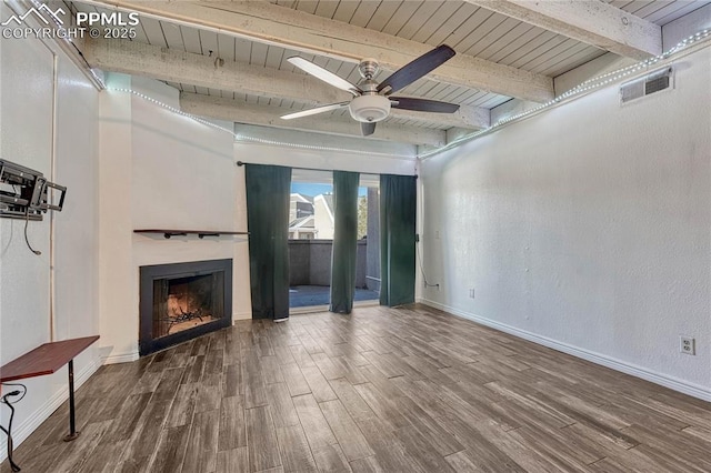 unfurnished living room featuring wood ceiling, ceiling fan, wood-type flooring, and beam ceiling