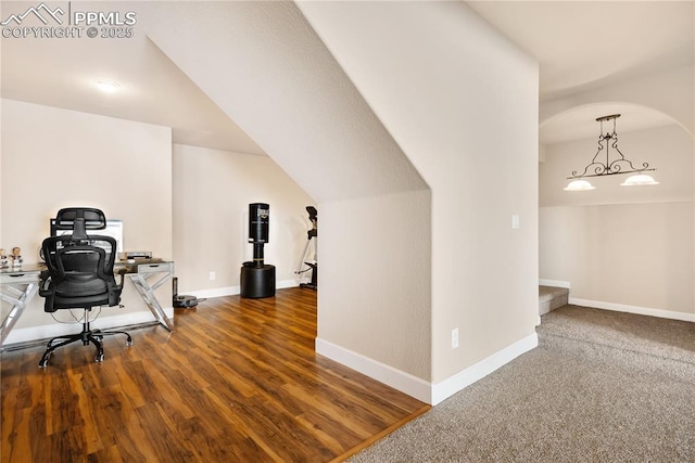 office space with dark hardwood / wood-style flooring