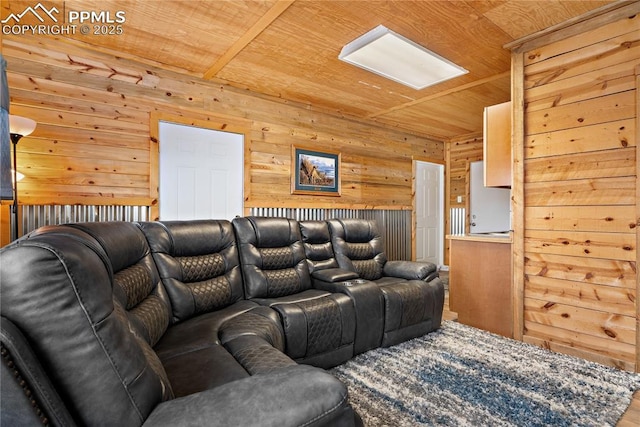 cinema room featuring wooden ceiling and wood walls