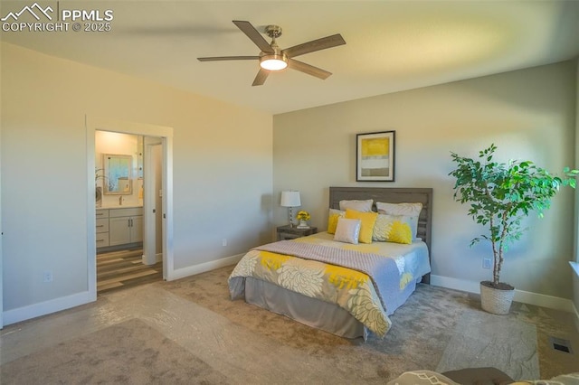 bedroom with ceiling fan and connected bathroom