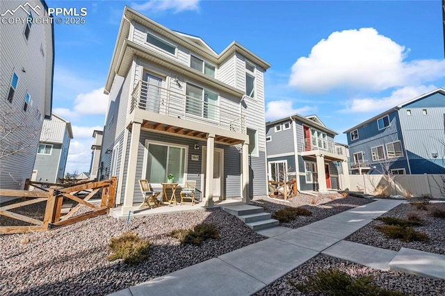 townhome / multi-family property featuring a patio