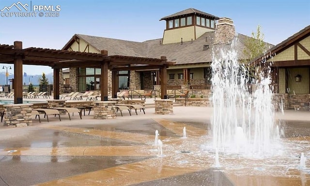 view of home's community with a pergola