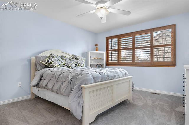 bedroom featuring light carpet and ceiling fan