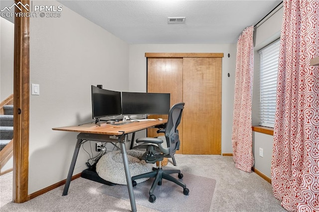 view of carpeted office space