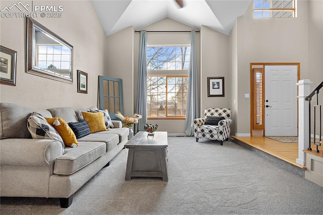 carpeted living room featuring vaulted ceiling