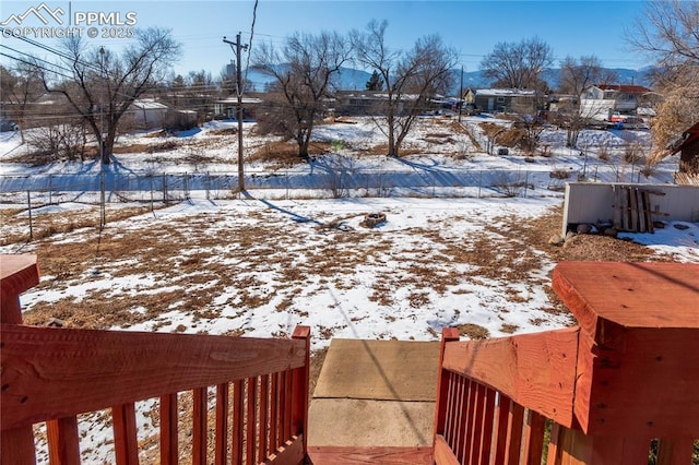 view of yard covered in snow