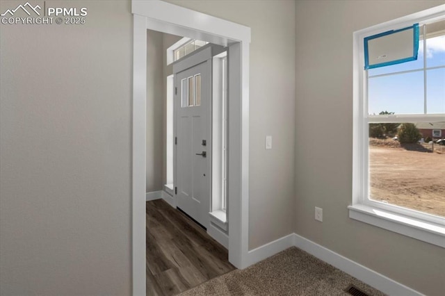 hallway with plenty of natural light