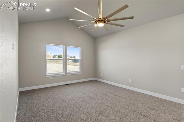 carpeted empty room featuring lofted ceiling and ceiling fan