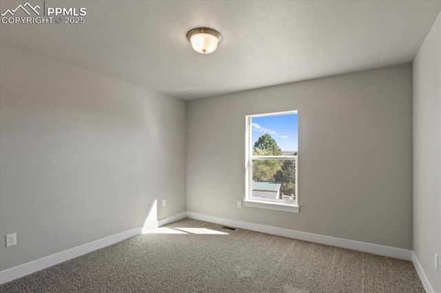 view of carpeted spare room