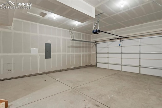 garage featuring a garage door opener and electric panel