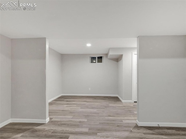 basement with light wood-type flooring