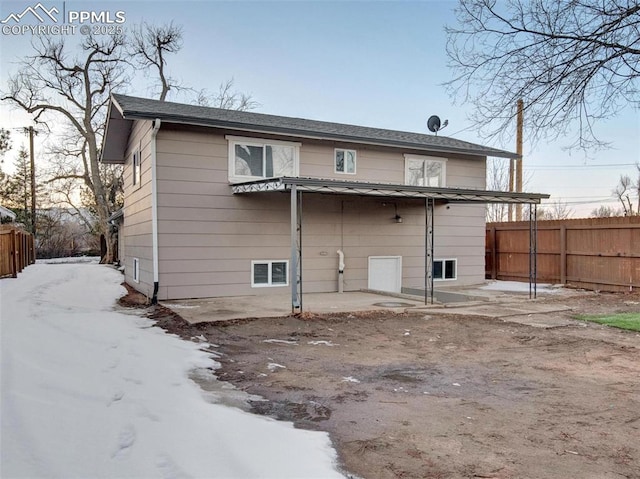 back of house with a patio