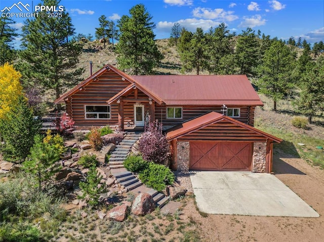 view of log cabin