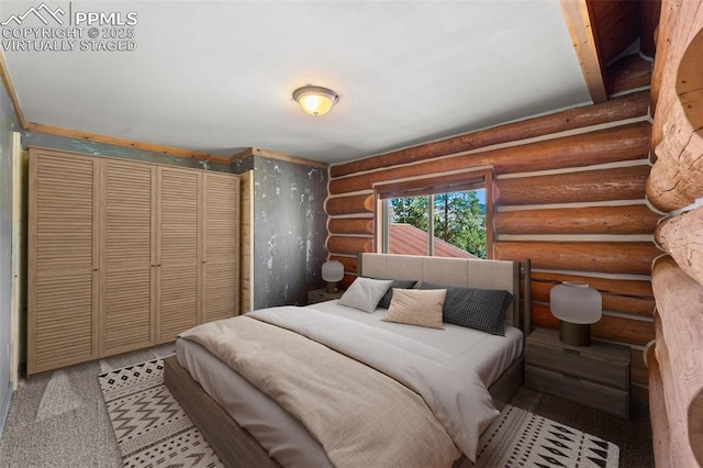 bedroom with light carpet and log walls